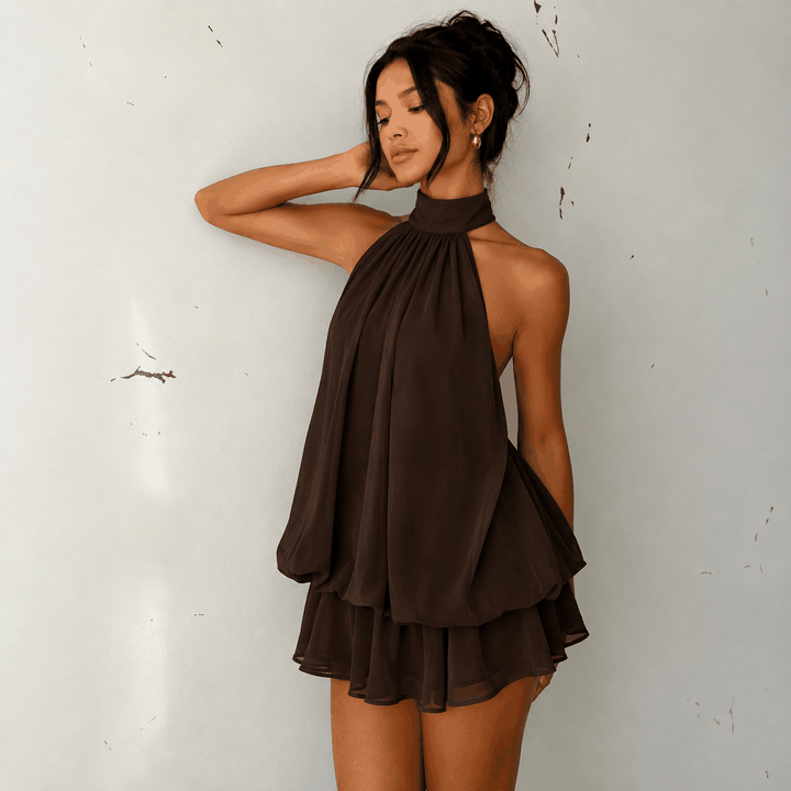 Sommerliches Neckholder-Kleid in gelb mit raffiniertem A-Linien-Schnitt und rückenfreiem Design, perfekt für Strand und Urlaub
