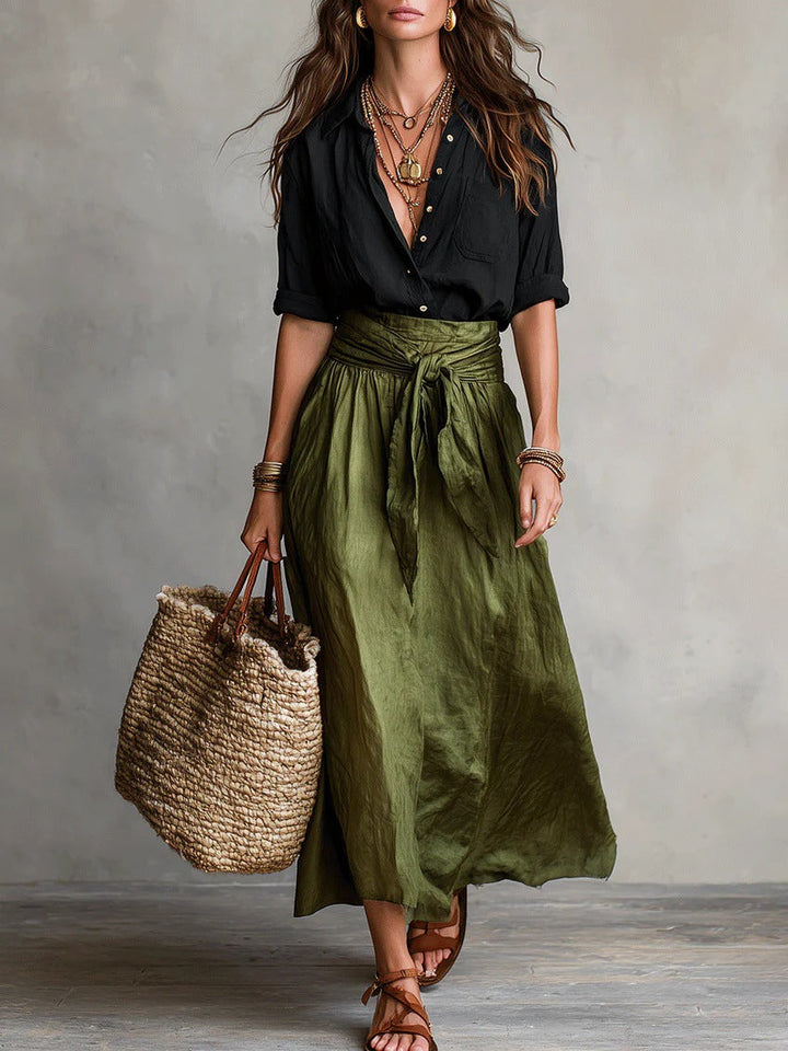 Damen Sommer-Set mit schwarzer Kurzarm-Bluse und grünem Rock für sommerlichen Stil