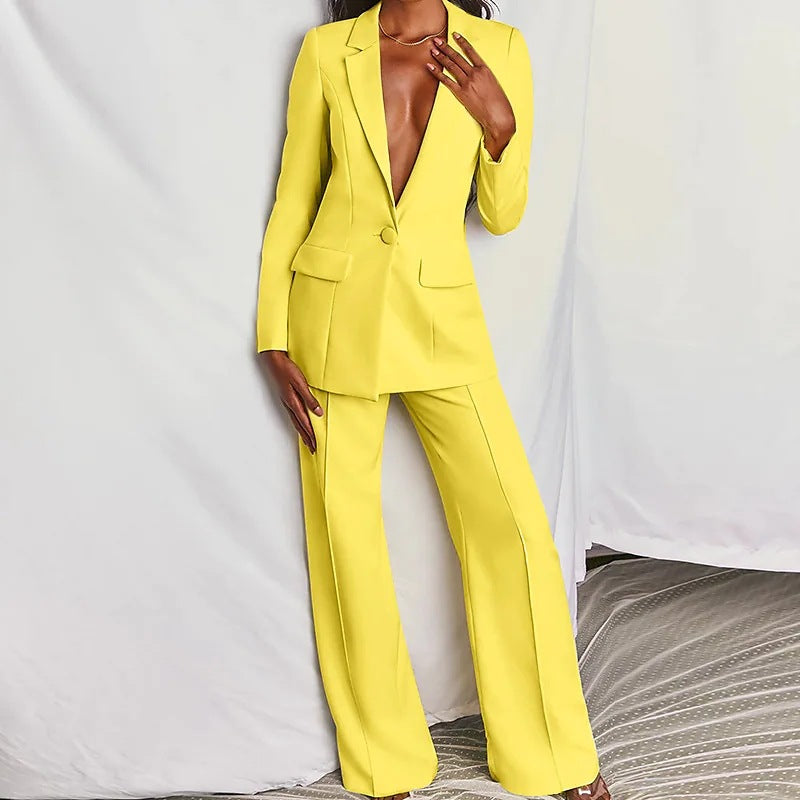 Damen Anzug: Gelber Anzug mit schmalem Revers und einer Knopfleiste, dazu ausgestellte Hose. Eleganter Business-Look. IsabellBoutique030