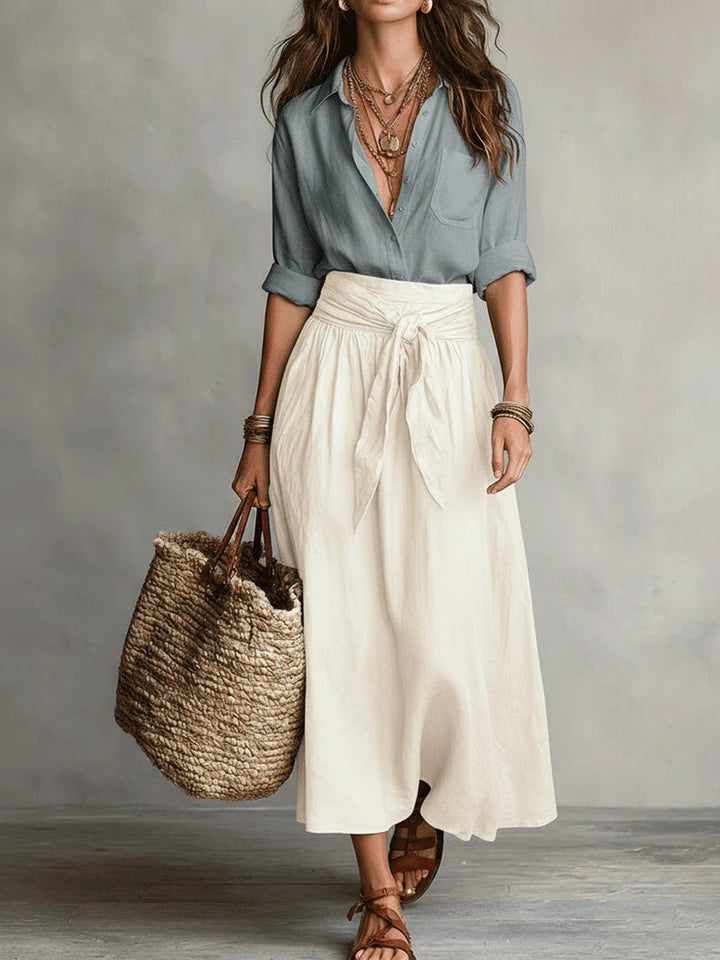 Damen Sommer-Set mit schwarzer Kurzarm-Bluse und grünem Rock im legeren Stil