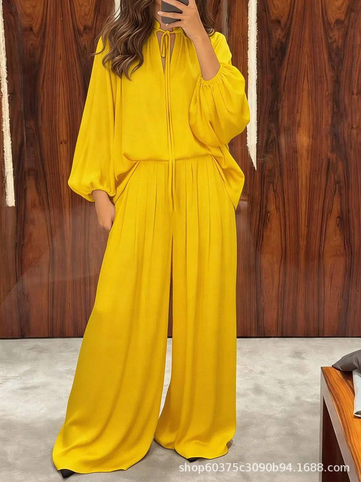 Gelbes Seiden-Zweiteiler-Set mit weiten Hosen und weitem Oberteil mit Puffärmeln und Schleifenkragen, IsabellBoutique030.