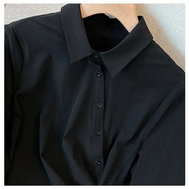 Schwarzes Hemd mit Kentkragen und Knopfleiste, klassischer Schnitt, elegant. IsabellBoutique030