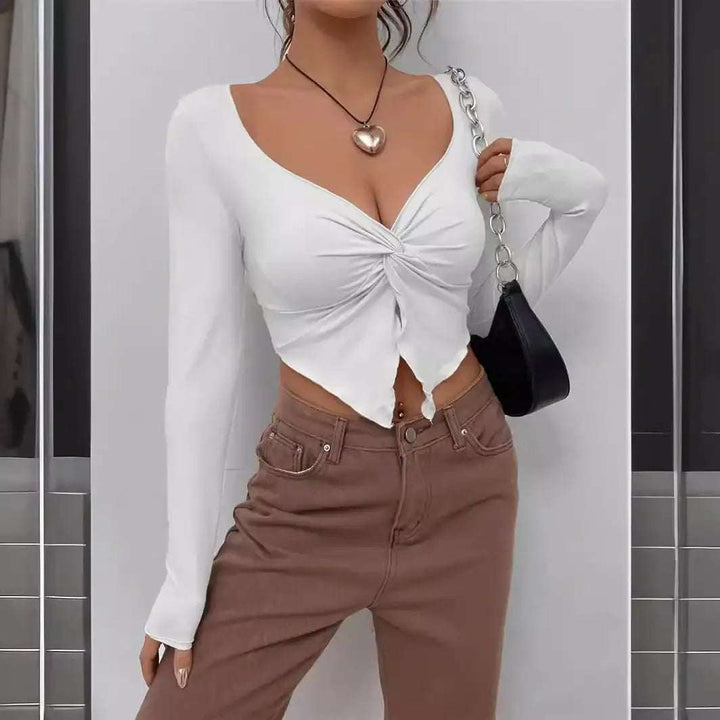 Figurbetontes Damen-Langarmshirt mit modernem Front-Twist und asymmetrischem Schnitt in Apricot