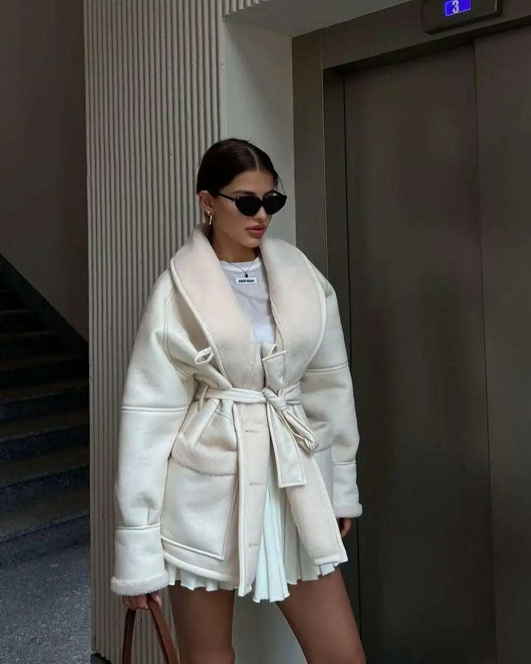 Damen Leder- und Fellmantel im türkischen Stil mit langem Ärmel und modischem Materialmix