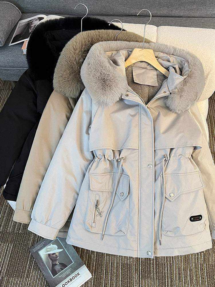 Elegante Damen Winterjacke mit dickem Fellkragen in unifarbenem Design für maximalen Kälteschutz und vielseitigen Business-Style