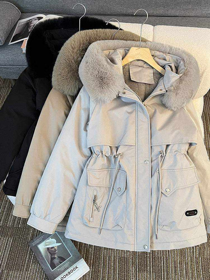 Elegante Damen Winterjacke mit dickem Fellkragen in unifarbenem Design für maximalen Kälteschutz und vielseitigen Business-Style