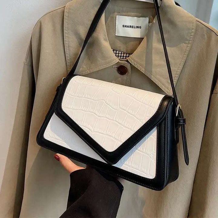 Weiße Umhängetasche mit Kroko-Prägung und schwarzem Rand, stilvolle Damenhandtasche IsabellBoutique030