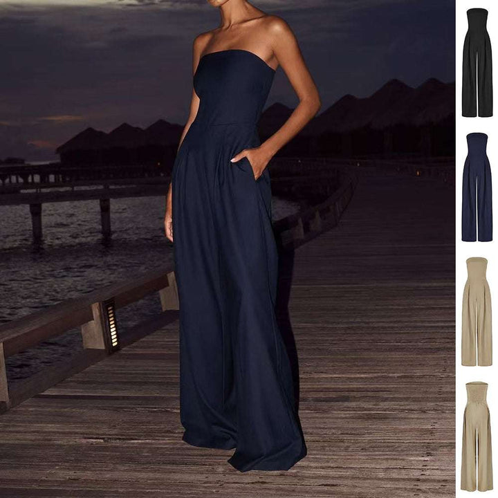Dunkelblauer trägerloser Jumpsuit mit weiten Beinen und Taschen, elegant und bequem. IsabellBoutique030