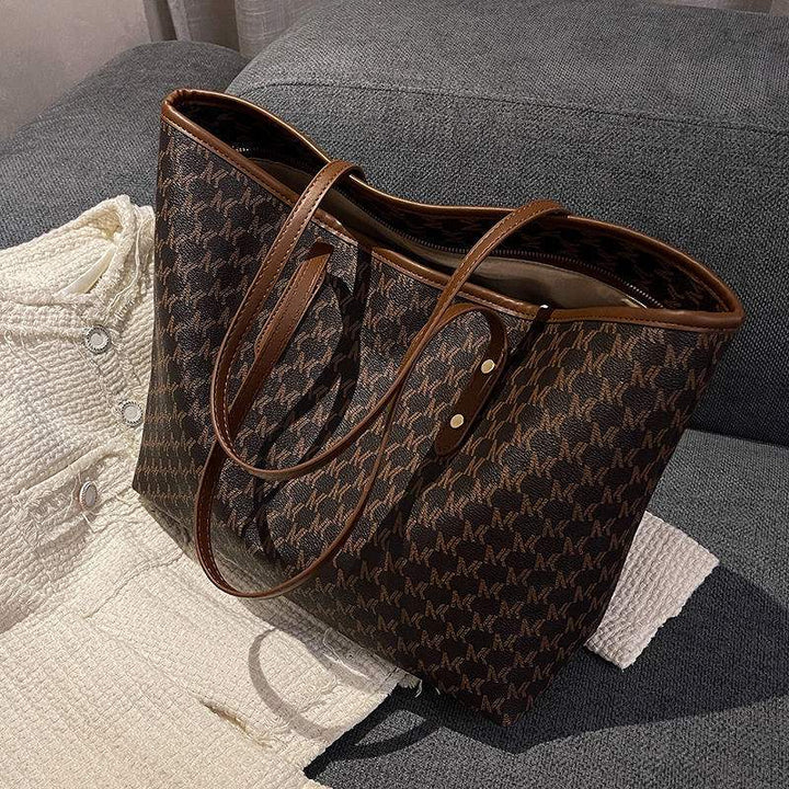 Damen Schultertasche aus hochwertigem PU-Material mit großem Fassungsvermögen und vielseitigem Design für Alltag und Reisen in mehreren Farben.