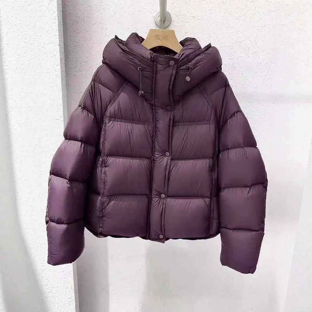 Damen Winter-Steppjacke in Schwarz mit Slim Fit Passform und langem Ärmel aus leichtem Polyester für kalte Tage