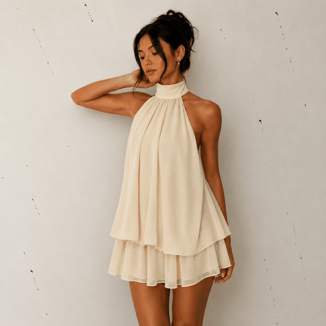 Sommerliches Neckholder-Kleid mit raffiniertem A-Linien-Schnitt und rückenfreiem Design in leuchtendem Gelb
