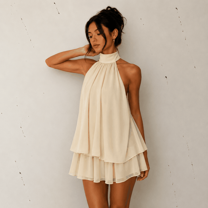 Sommerliches Neckholder-Kleid mit raffiniertem A-Linien-Schnitt und rückenfreiem Design in leuchtendem Gelb