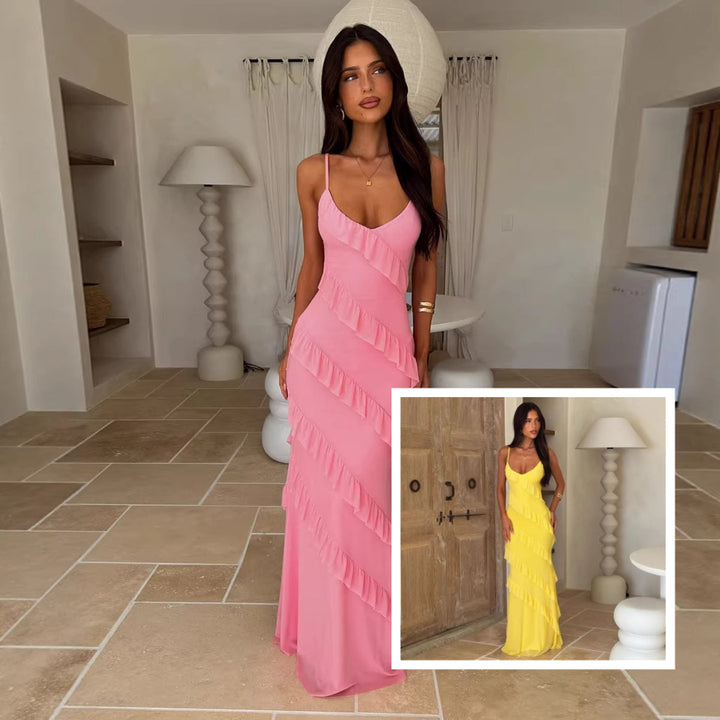 Langes, fließendes rosa Maxikleid mit Spaghettiträgern und diagonalen Rüschen. IsabellBoutique030