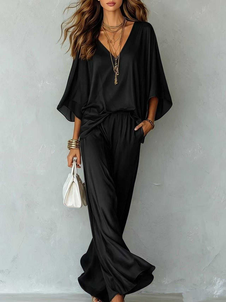 Elegantes Damen Satin-Set mit V-Ausschnitt Oberteil und Wide-Leg Hose in Aprikose