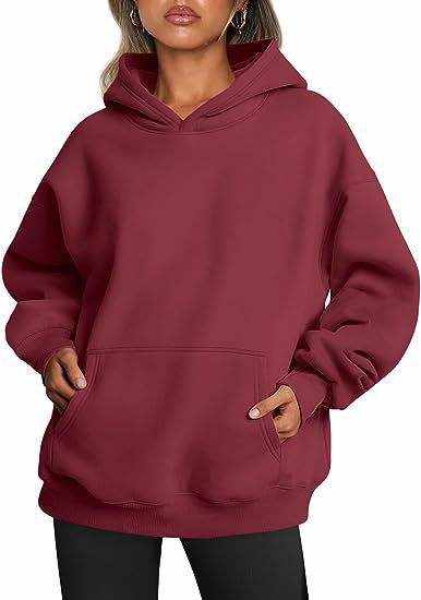 Damen Hoodie im Oversize-Stil mit Kapuze und praktischen Taschen in einfarbigem Design