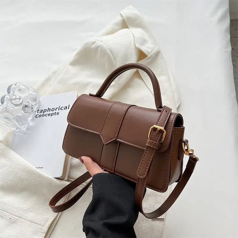 Modische Damen Pendler-Umhängetasche aus hochwertigem PU-Material mit praktischer Mittelfach-Außentasche und horizontaler Form.