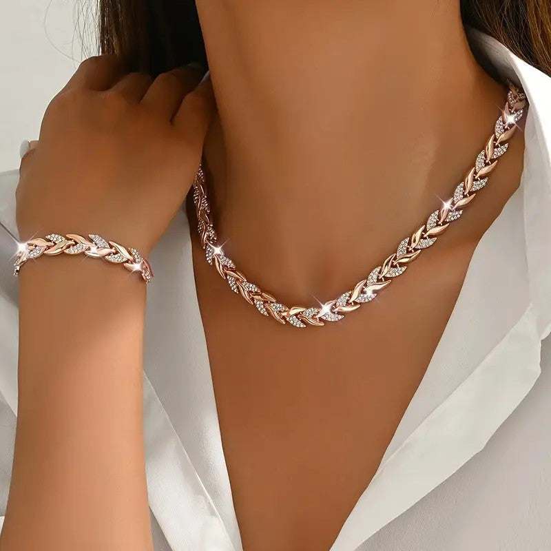 Rosenvergoldete Kette mit Blattmuster und Zirkonia, passendes Armband. IsabellBoutique030