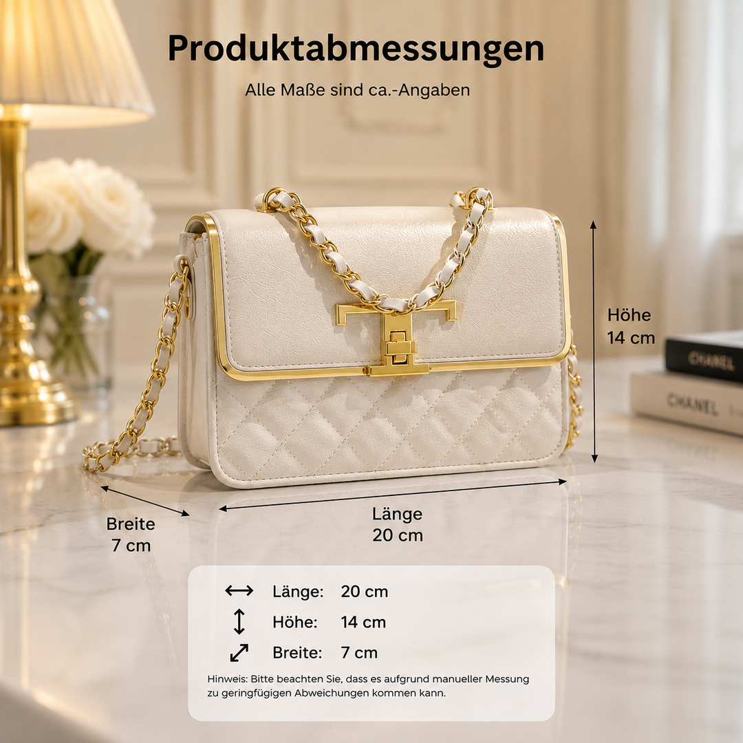 Elegante Handtasche mit funkelnder Diamantkette als Schultertasche in Schwarz und Weiß