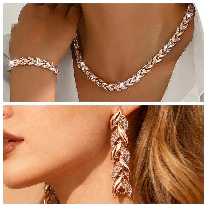 Roségoldenes Schmuckset mit Blattmotiv und Zirkonia-Steinen: Collier, Armband und Ohrringe. IsabellBoutique030