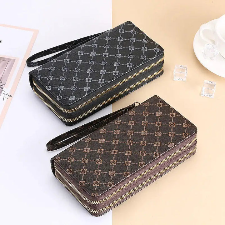 Schwarze lange Geldbörse mit Reißverschluss, Münzfach und Clutch-Design