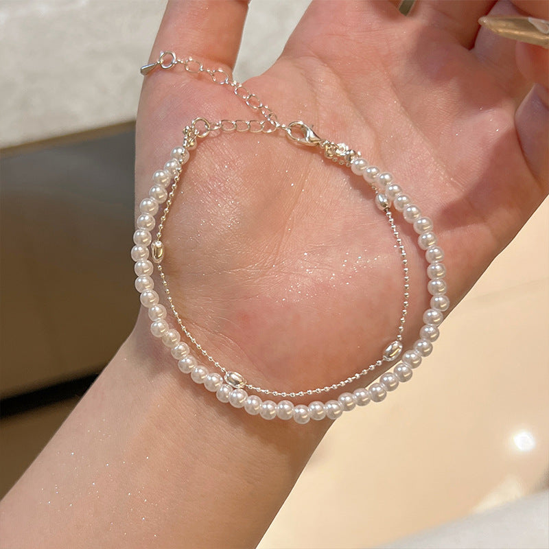 Weißes Perlen Armband für Frauen mit elegantem, zeitlosem Design