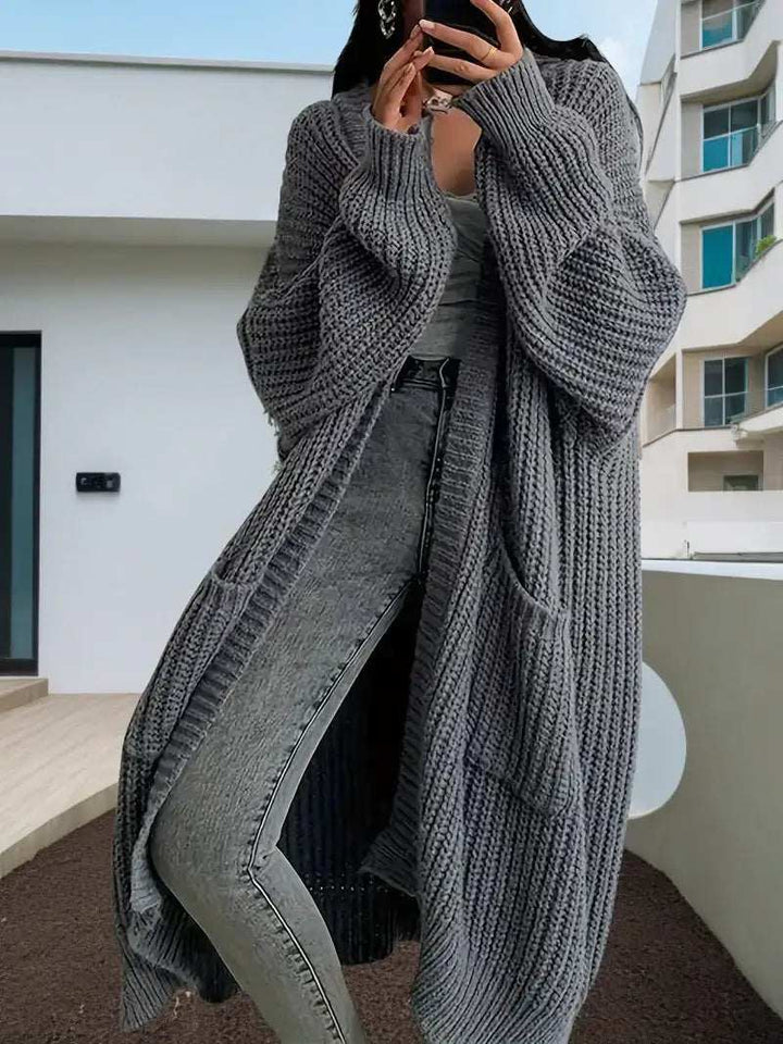Langer Damen-Strickcardigan in Teddyoptik mit Taschen, locker geschnitten für Herbst und Winter