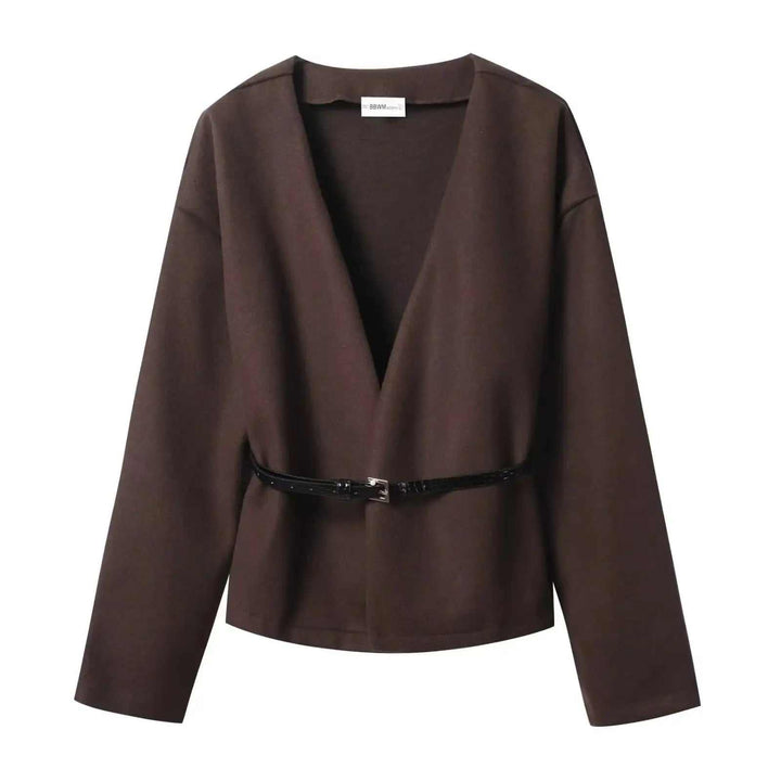 Damen V-Neck Top locker geschnitten in Schwarz mit Gürtel und Patchwork-Design, langärmlig, mittellang aus Polyester