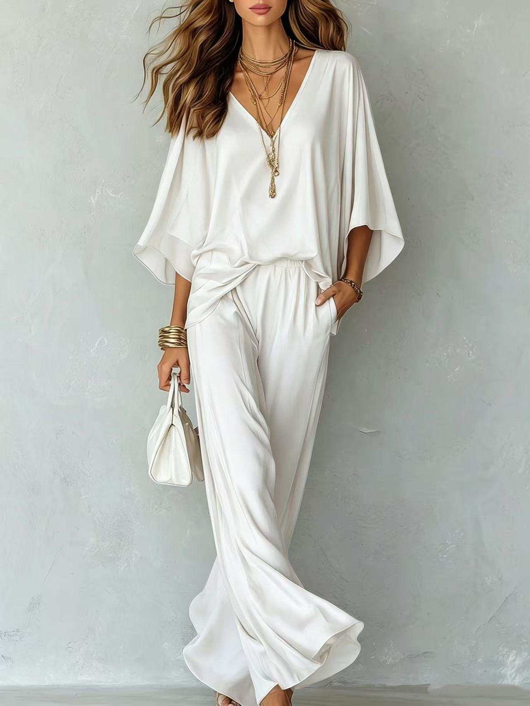 Elegantes Damen Satin-Set mit V-Ausschnitt Oberteil und weit geschnittener Wide-Leg Hose in Aprikose
