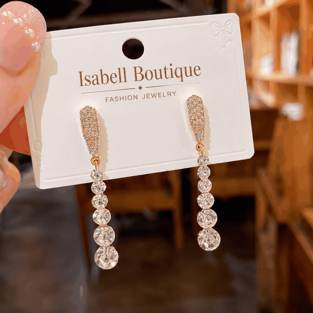 Lange silberne Strass Ohrringe mit Tropfen-Design und funkelnden Kristallsteinen für Damen