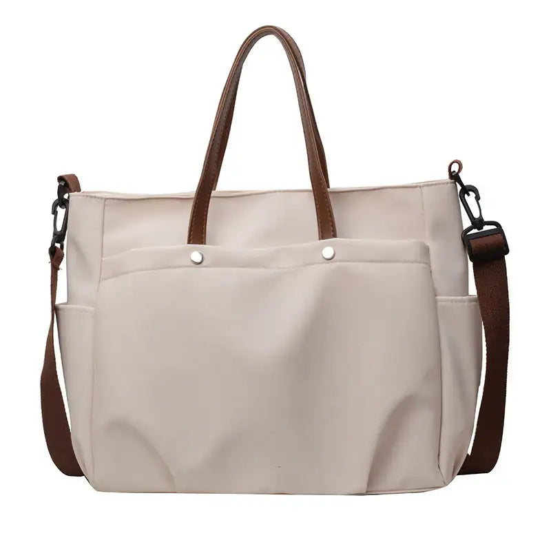 Modische lässige schlichte Schultertasche mit großem Fassungsvermögen und offener Außentasche in mehreren Farben