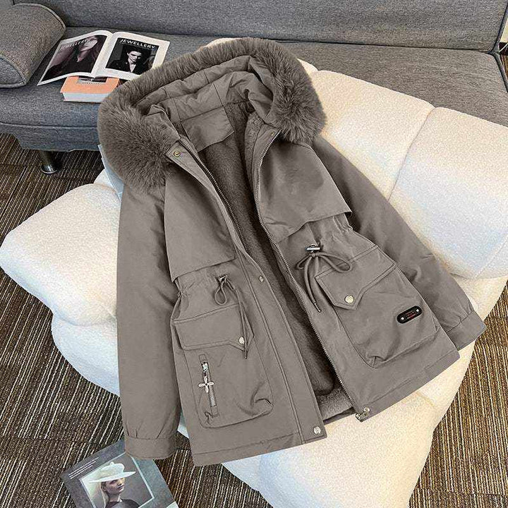 Elegante Damen Winterjacke mit dickem, fest integriertem Fellkragen und unifarbenem Design für maximalen Kälteschutz im Winter